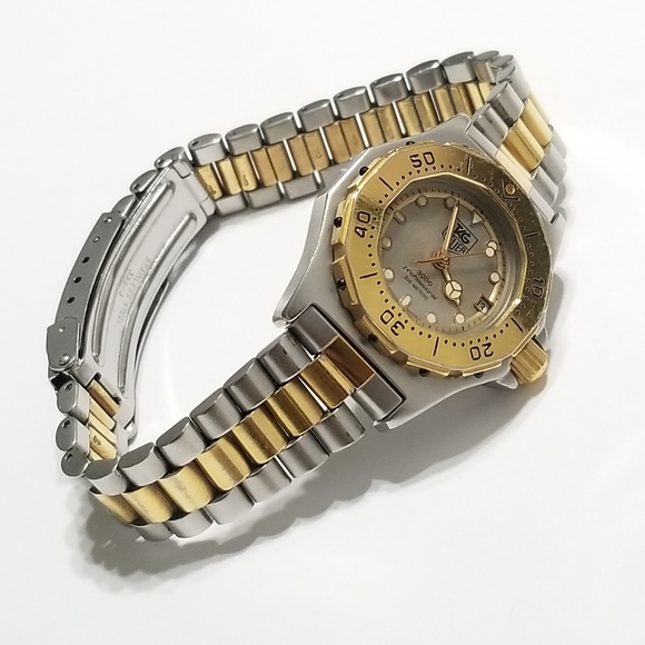 Tag Heuer Accessories - Authentic Tag Heuer two tone Swiss made watch.
